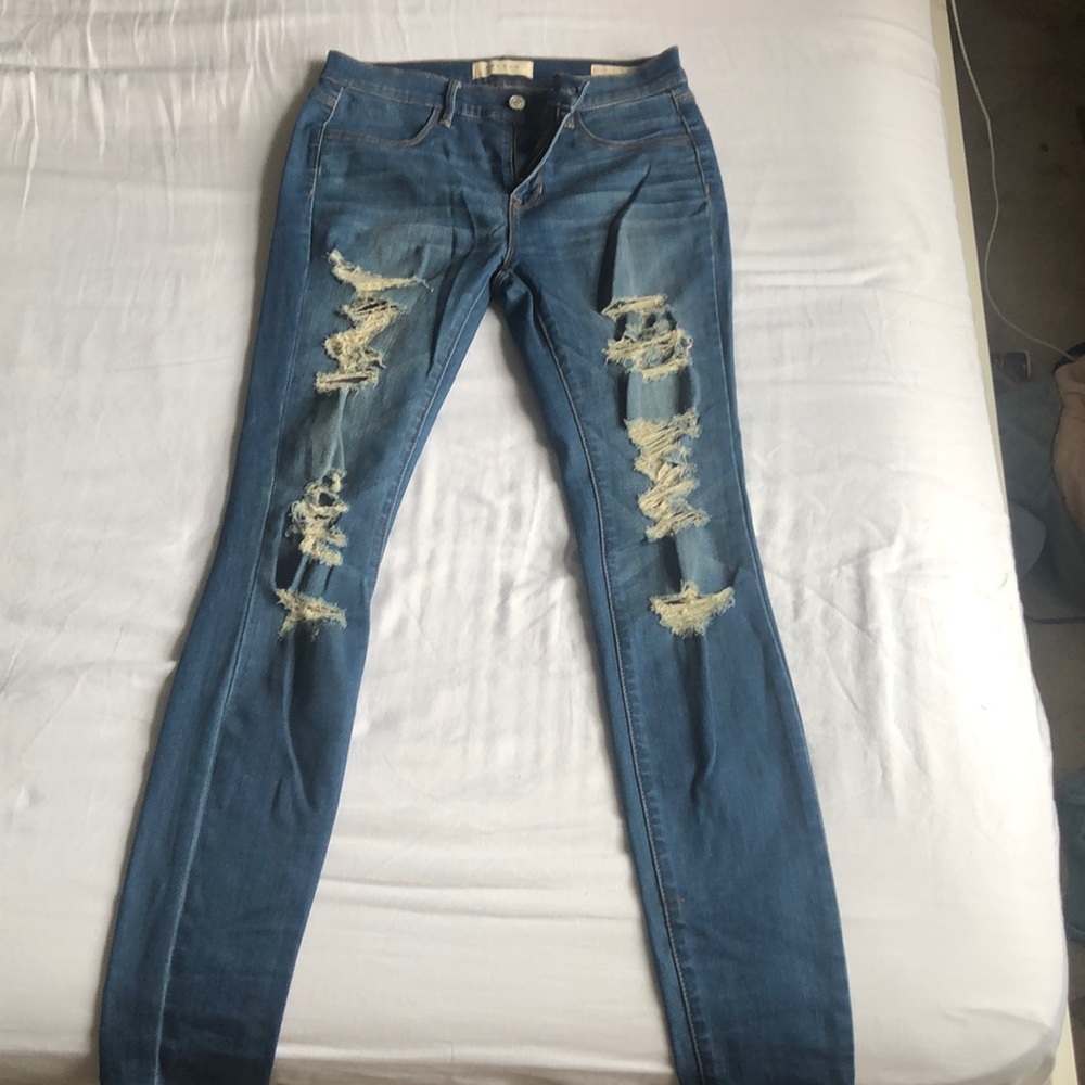 Blue ripped jeans